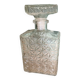 Old molded glass whiskey bottle