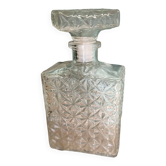 Old molded glass whiskey bottle