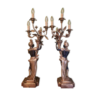 Paire de nubiens porte torchère en bois doré baroque