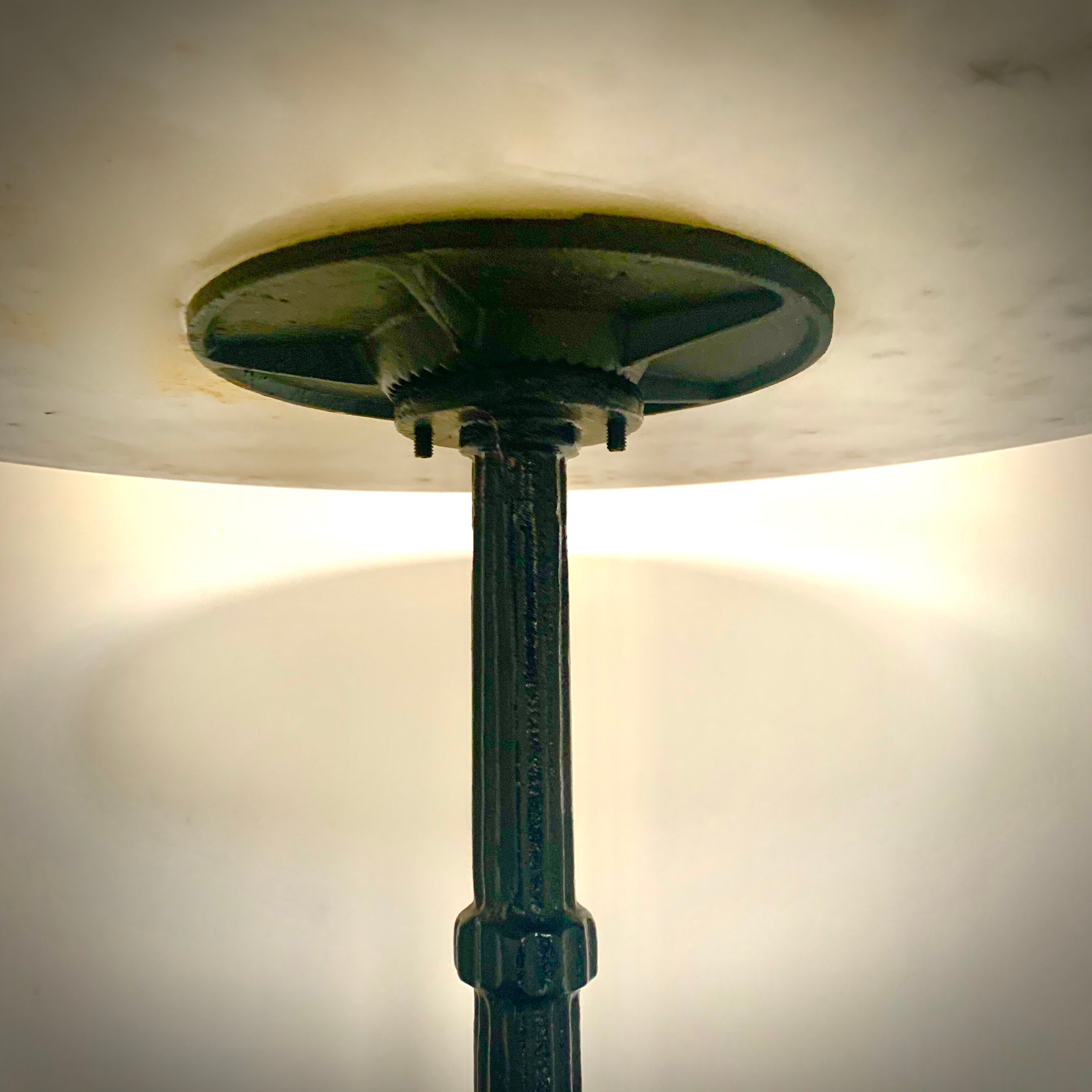 Bistro table with cast iron foot and marble tray