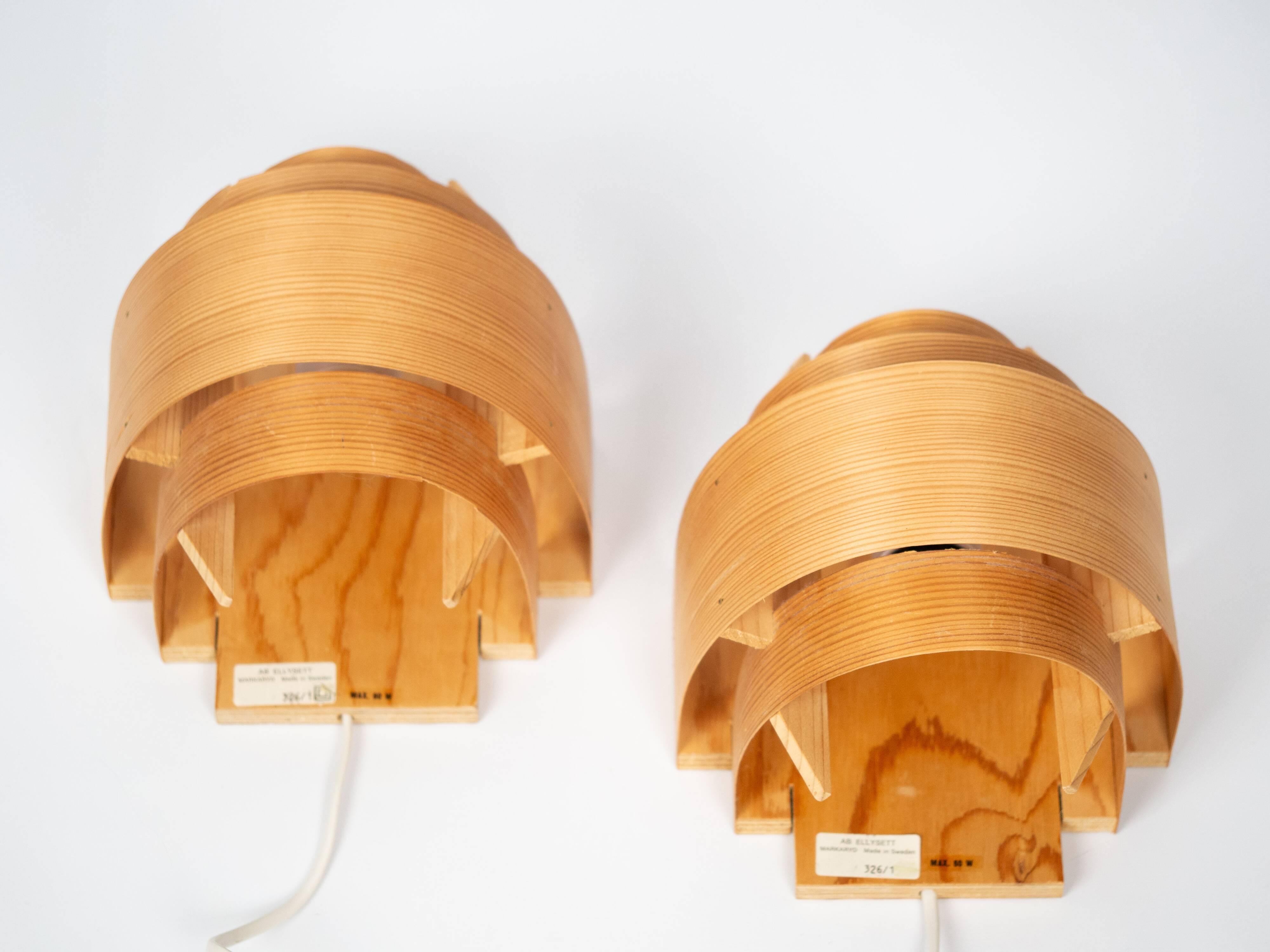 Pair of pine wood wall lamps V327 by Hans-Agne Jakobsson, AB Elysset, 1960s