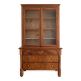 Antique wooden storage cabinet with display case.