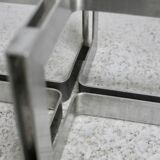 Coffee table with steel base and smoked glass slab. Circa 197