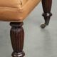 Sheepskin ottoman/coffee table on wheels in English chesterfield style