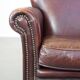 Sheep leather armchair correctly finished with decorative nails