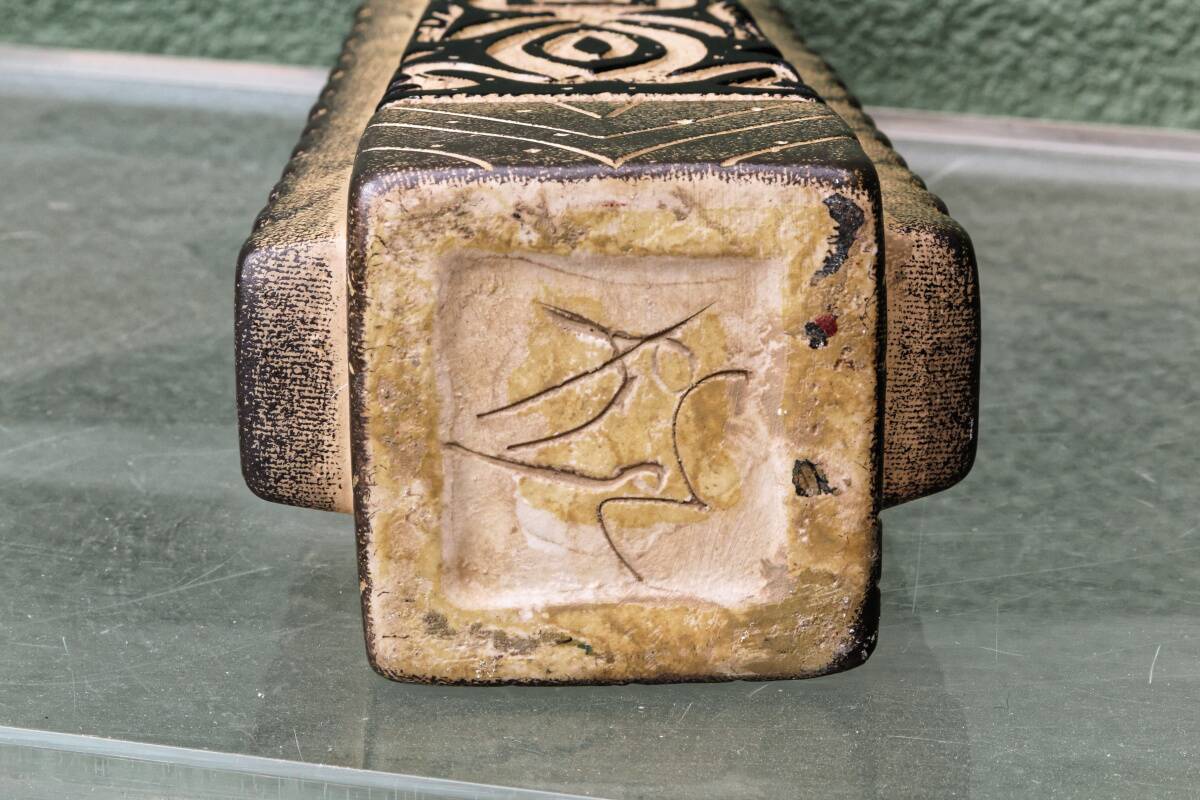 Modernist ceramic vase, signed, with incised geometric tribal decoration.