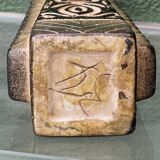 Modernist ceramic vase, signed, with incised geometric tribal decoration.