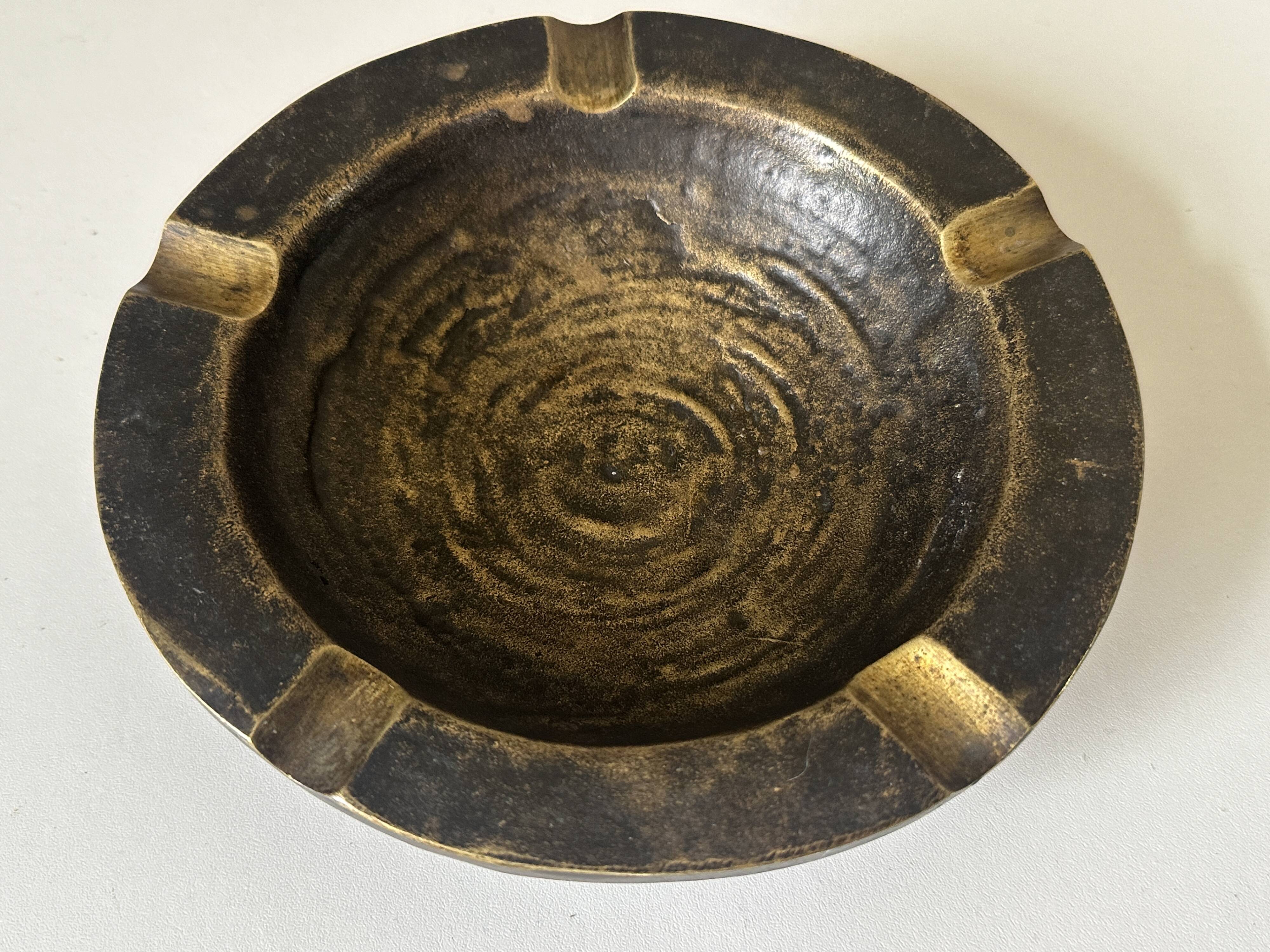 Vintage bronze ashtray design from the 60s