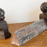 Pair of cast iron chenets, Love victorious