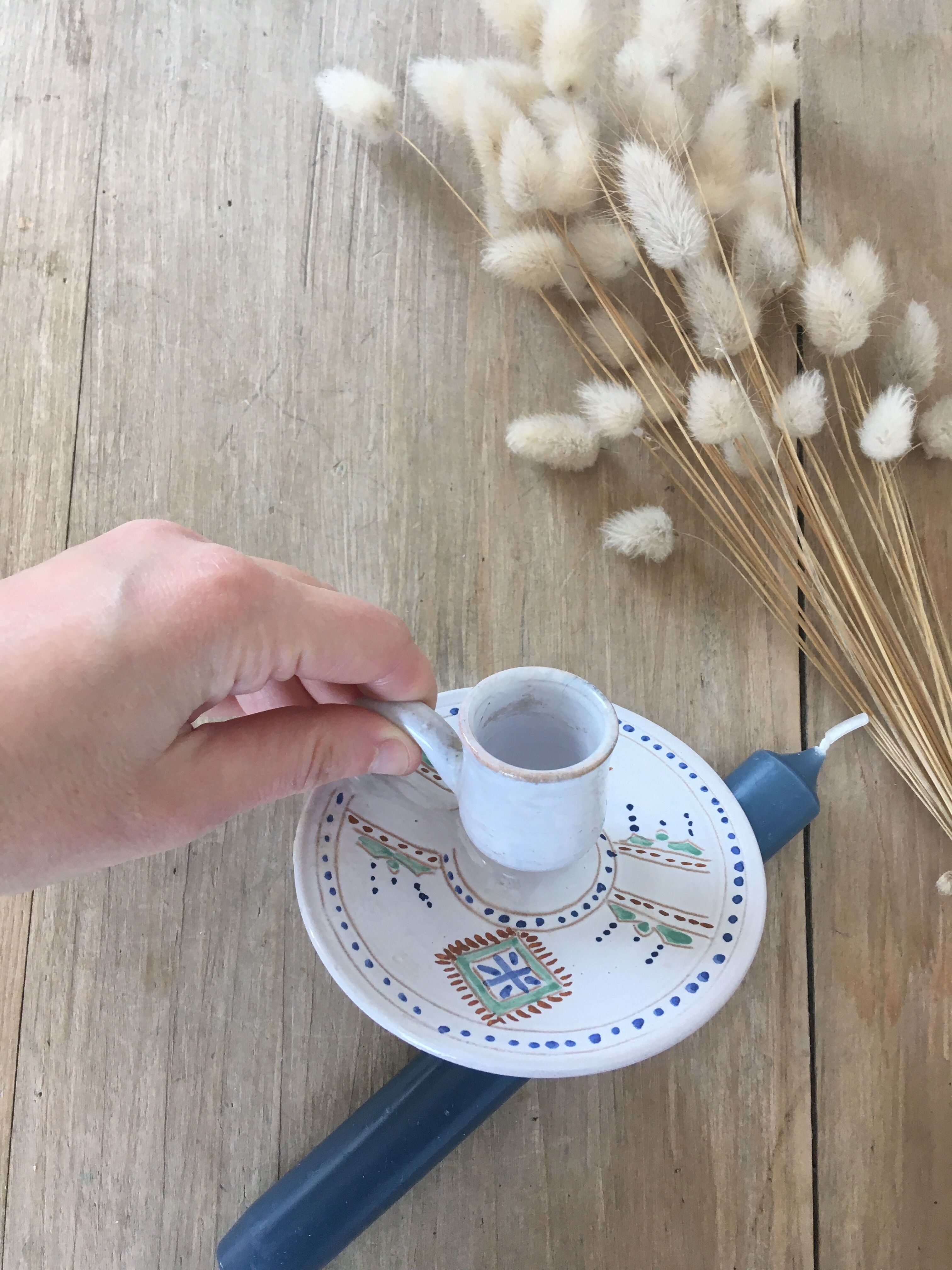 Green ceramic cellar rat candle holder