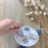 Green ceramic cellar rat candle holder