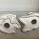Pair of bookends with a matte white glaze for children.