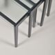 Set of nesting tables in black stained wood and glass top, 1960s