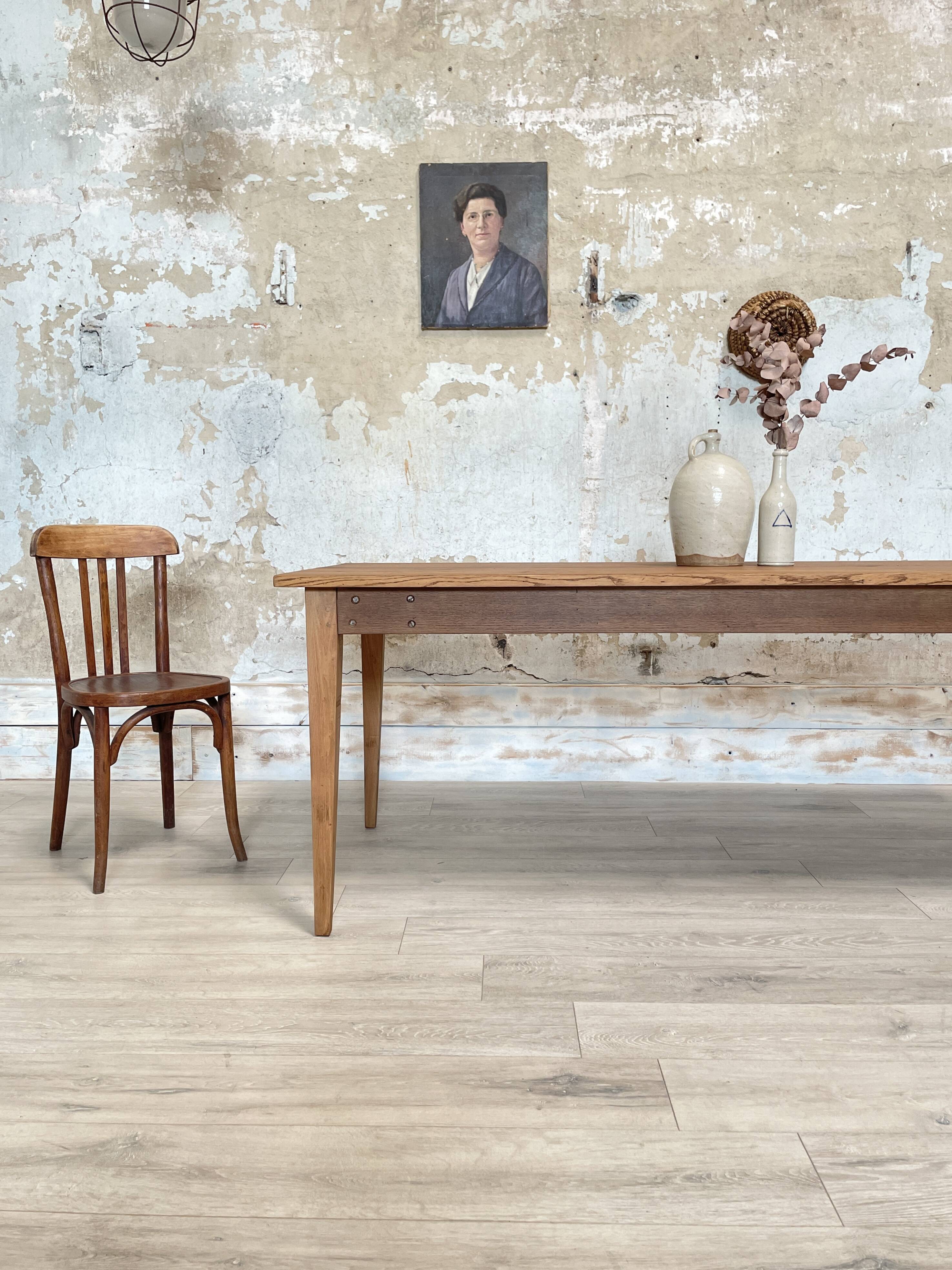 Vintage farm table with spindle legs.