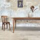 Vintage farm table with spindle legs.