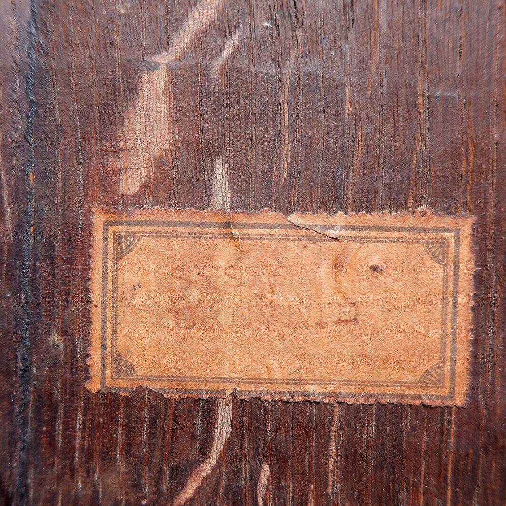 Hexagonal pedestal table or side table with a lattice structure and star pattern.