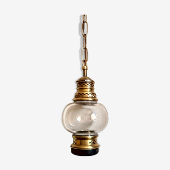 Old glass and vintage brass lantern, marine lantern suspension with chain