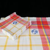 Old tablecloth and 11 towels crossed red blue