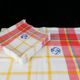 Old tablecloth and 11 towels crossed red blue
