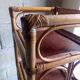 Shelf selette on wooden feet and vintage rattan