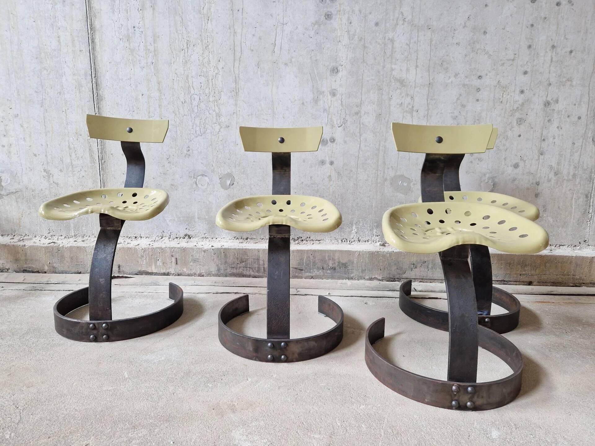 Unique set of 4 metal tractor seat chairs, 1990