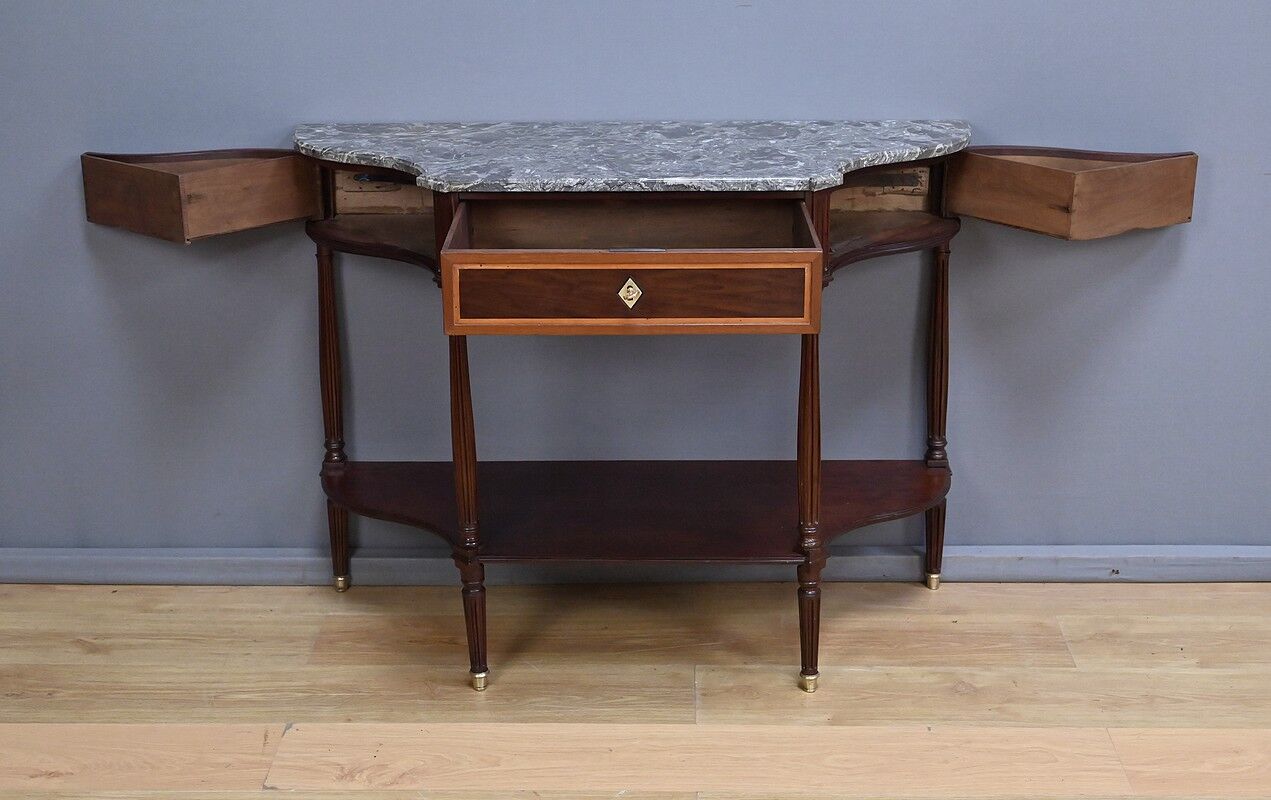 Console in mahogany and marble, Louis XVI period – late 18th century.