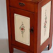 Vintage brown wooden bedside table hand-painted from the 1950s with a drawer and door.