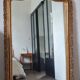 Antique Louis Philippe mirror with a pediment.