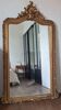Antique Louis Philippe mirror with a pediment.