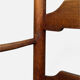 Antique rustic armchair in walnut and leather, 18th century.