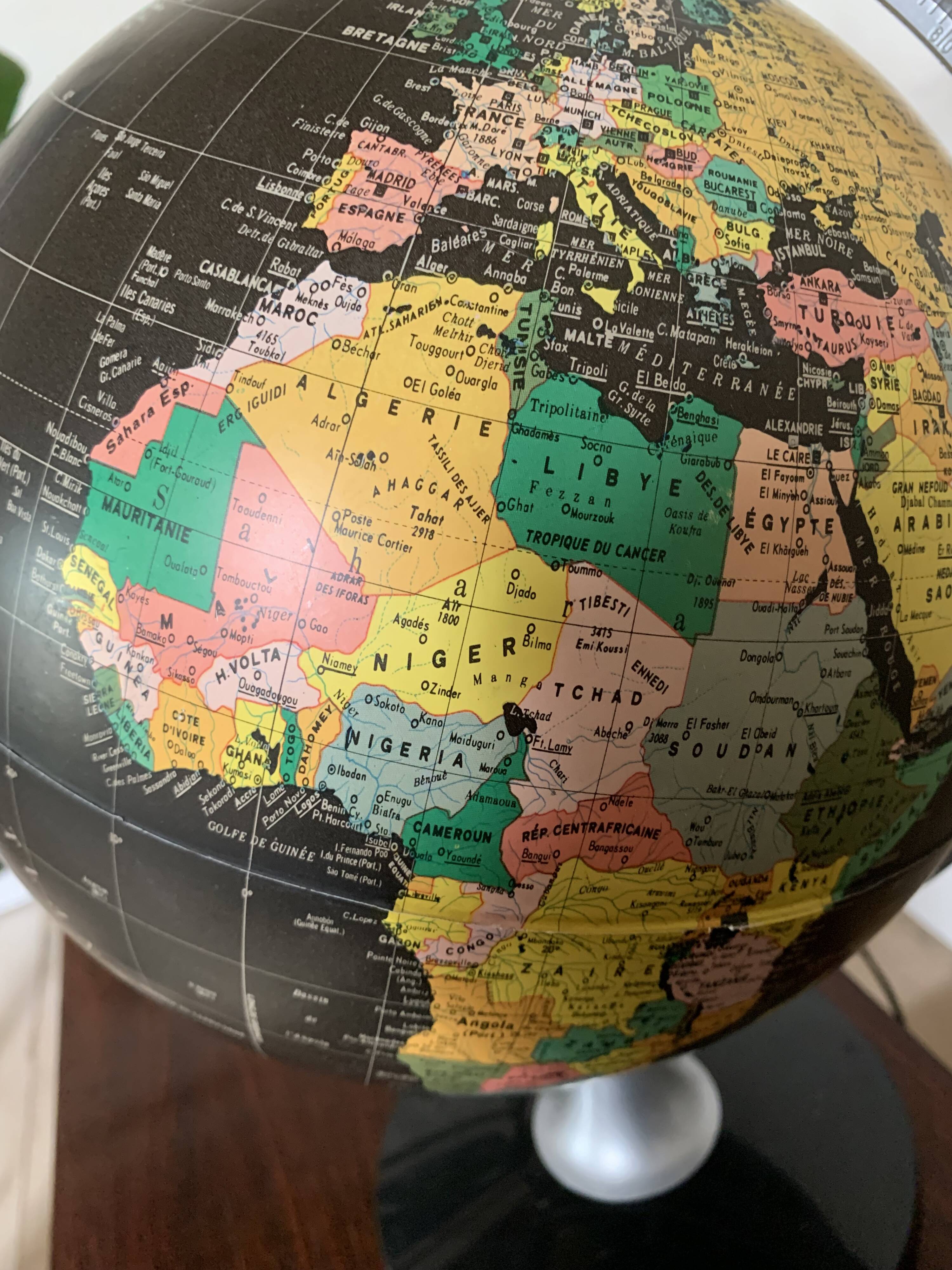 Black world map globe