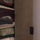 Large wardrobe with large painted and patinated beveled mirror