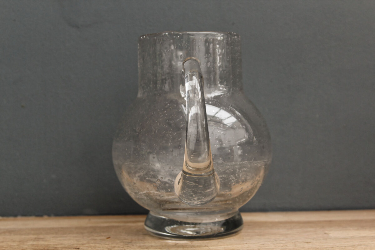 Decanter made of bubbled glass, blown