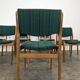 Set of 8 vintage green fabric chairs.