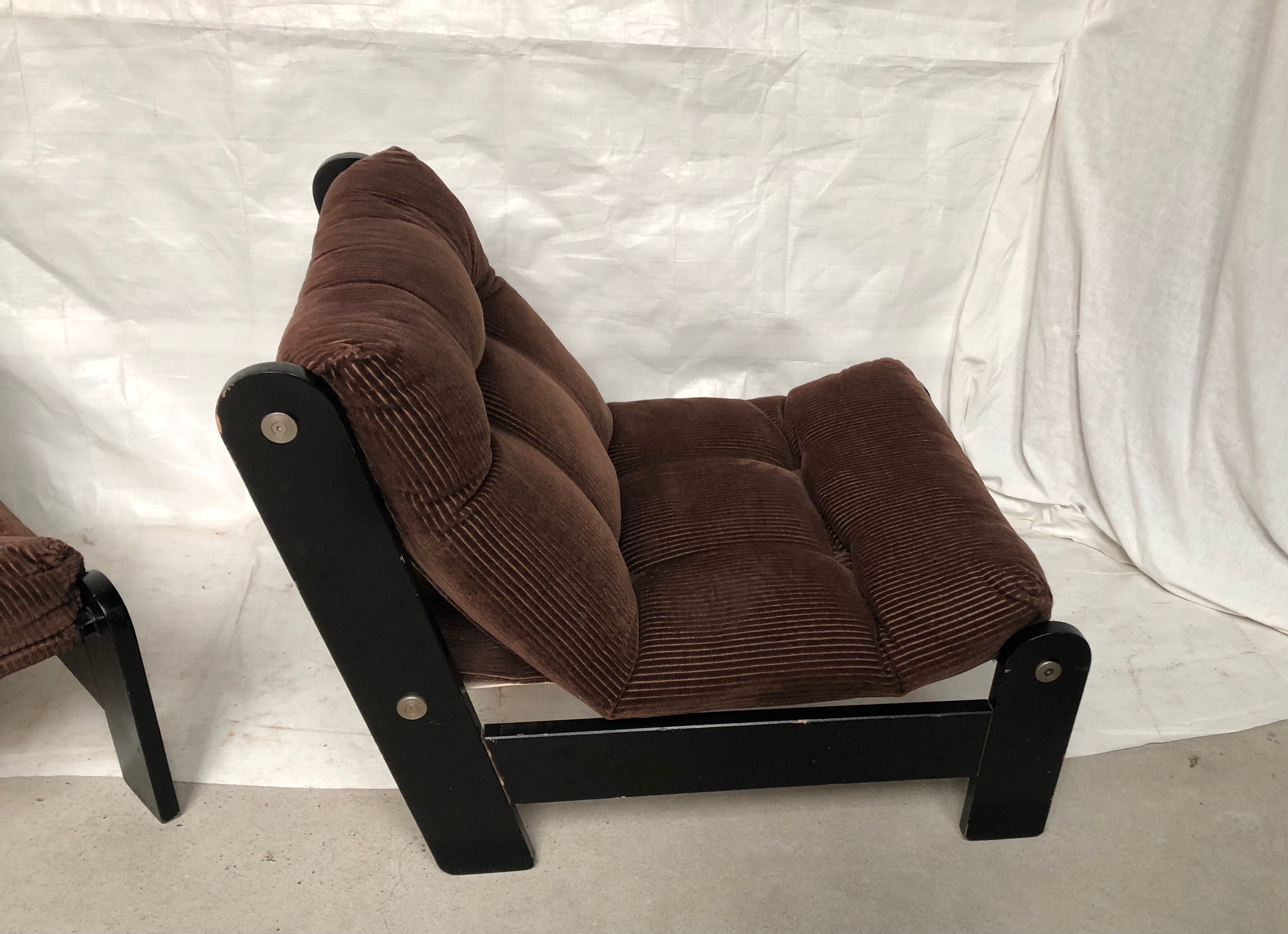 Modernist armchairs wood heaters and brown velvet vintage 70s