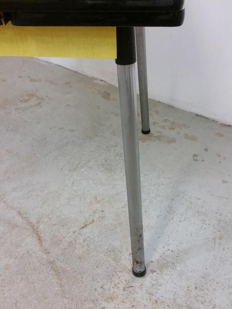 Table and chairs in formica yellow