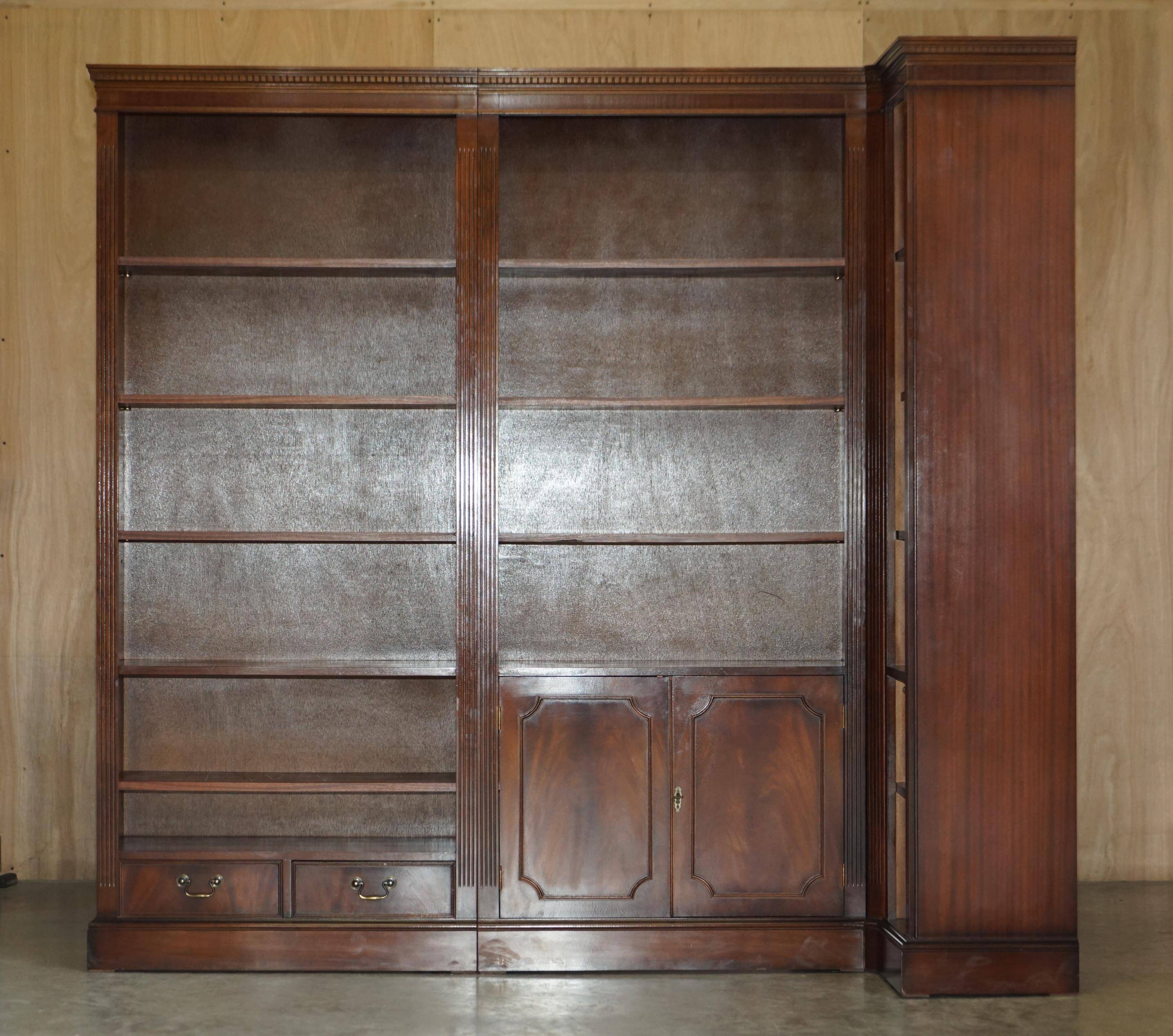 Corner library made of flamed hardwood, in 3 parts.