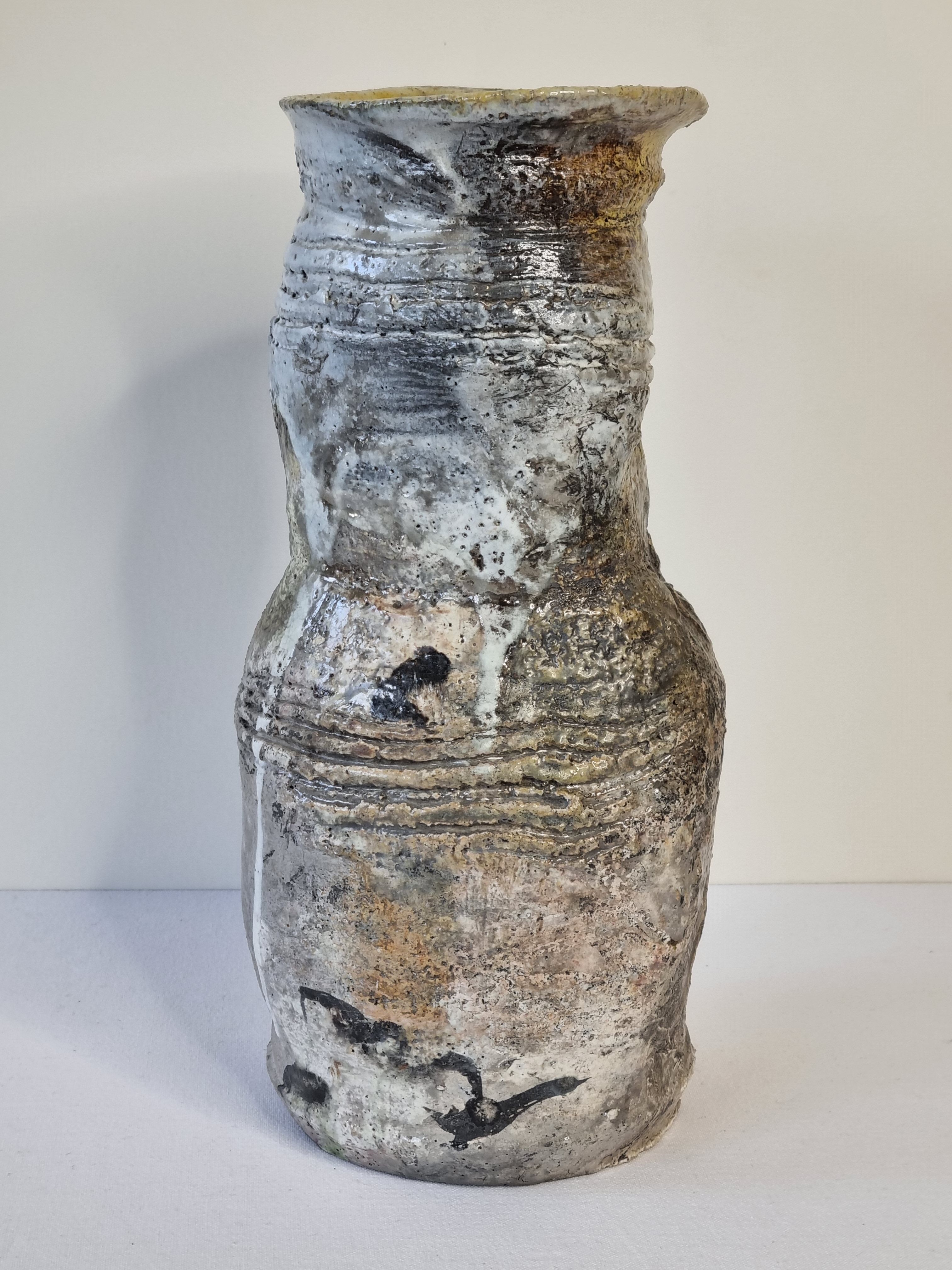 Enamelled ceramic roll vase