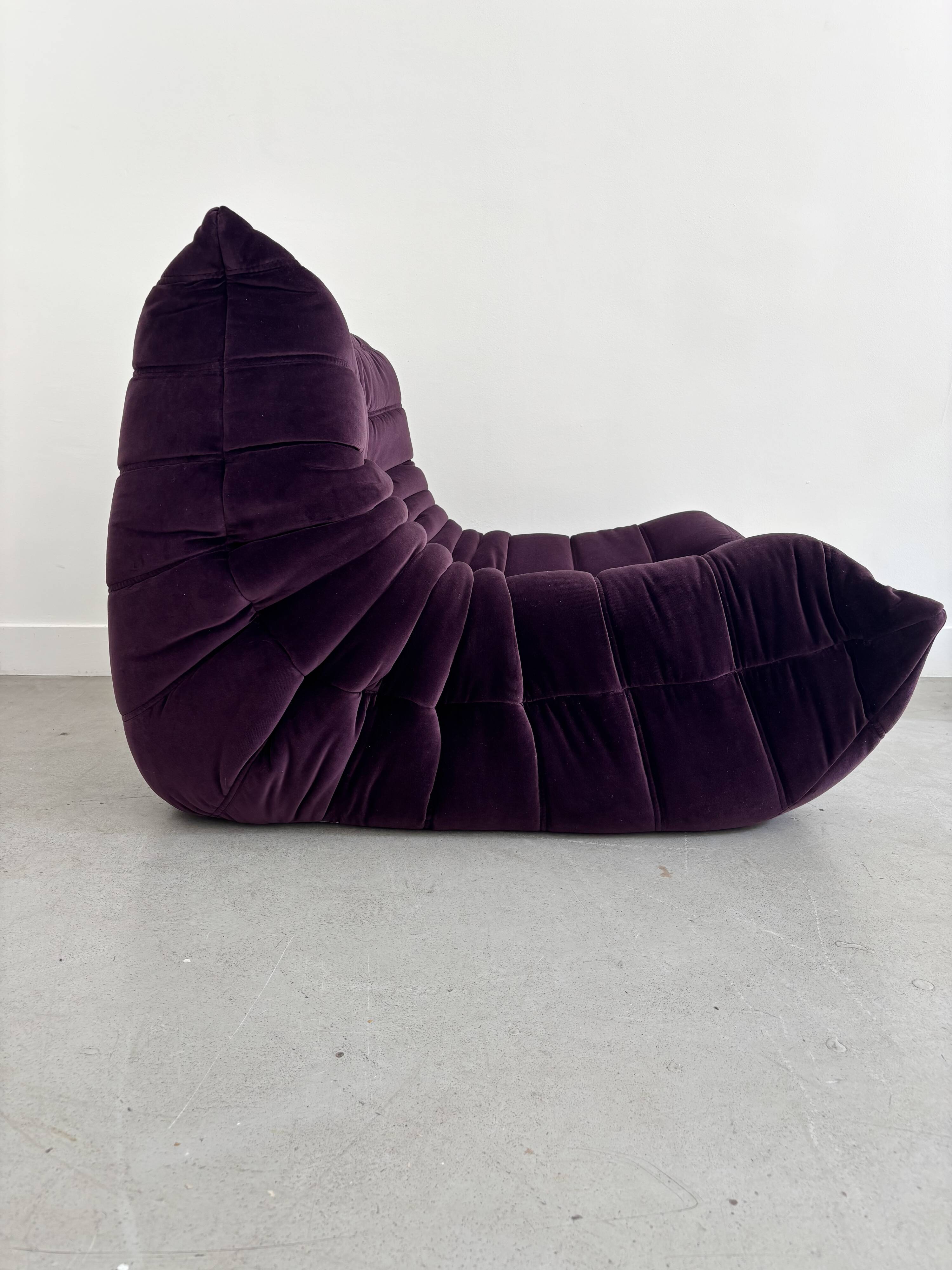 Purple "Togo" armchair by Michel Ducaroy
