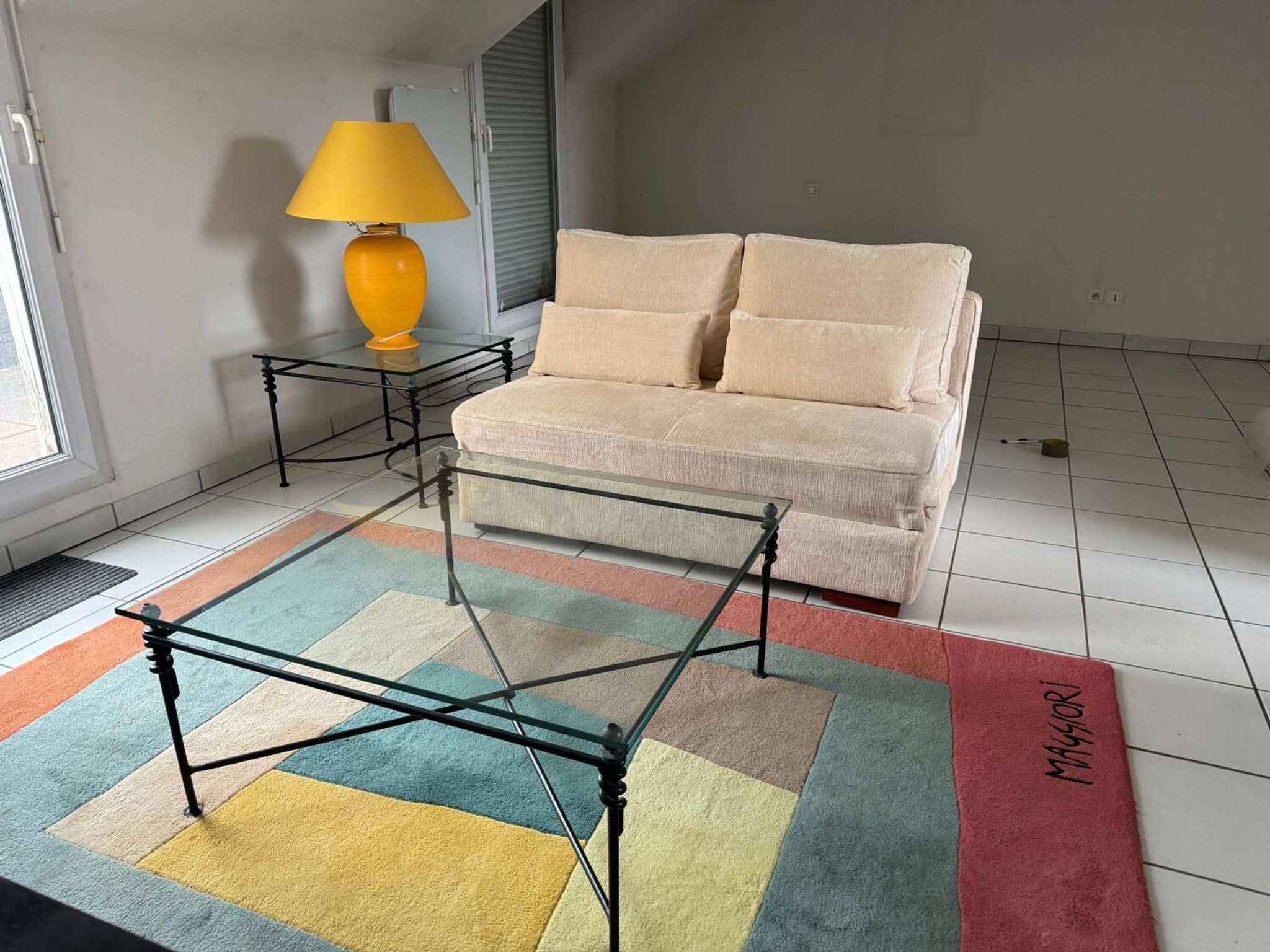 Large wrought iron and glass coffee table by Jacques Ducru