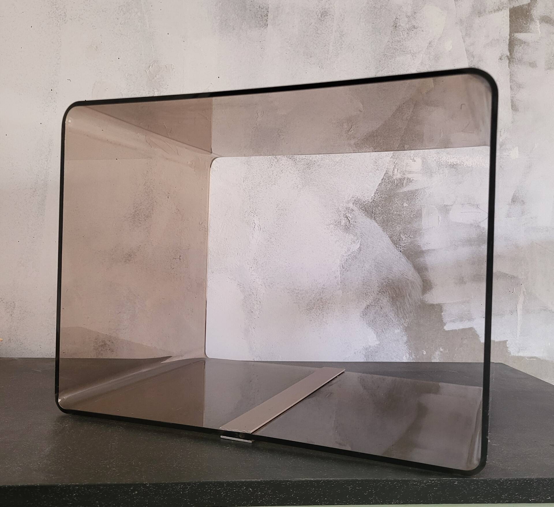 Rectangular piece of furniture or coffee table in smoked plexiglass by Michel Dumas.