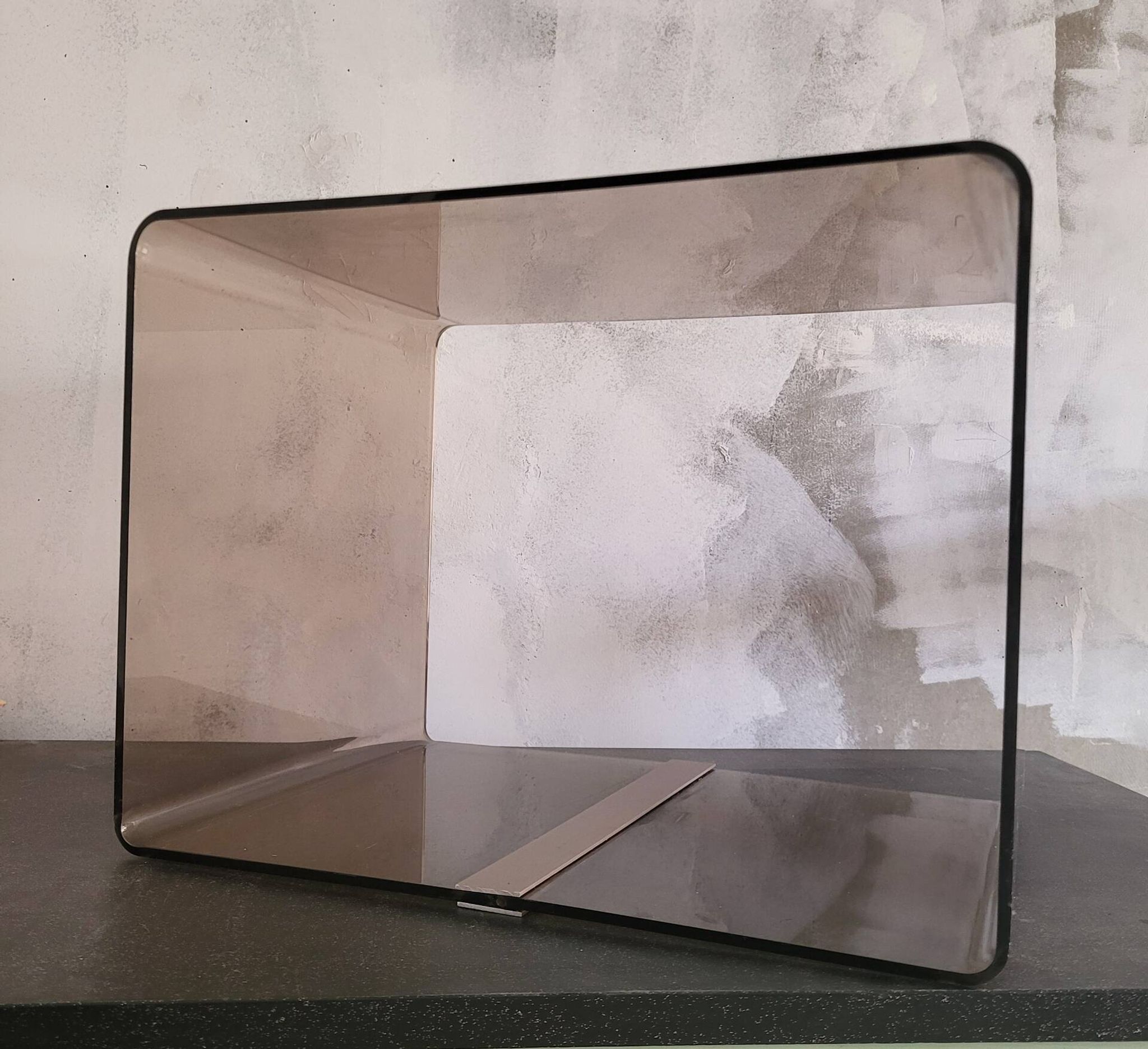Rectangular piece of furniture or smoked plexiglass coffee table by Michel Dumas.