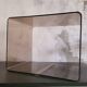 Rectangular piece of furniture or coffee table in smoked plexiglass by Michel Dumas.