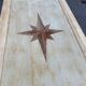 Renovated solid wood coffee table in chic country seaside style.