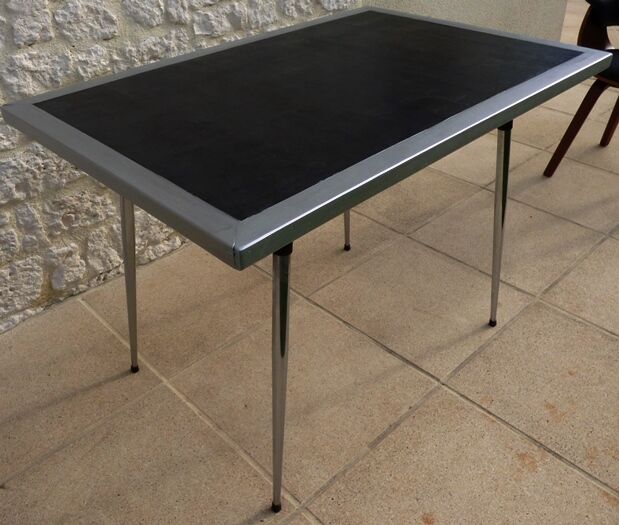 *Table with concrete top and industrial style stainless steel contour