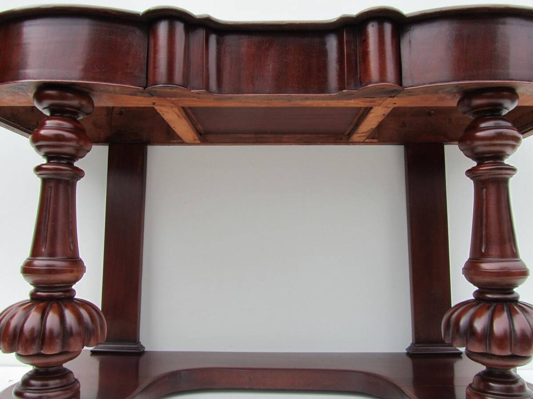 Mahogany and green leather console, 1860-70