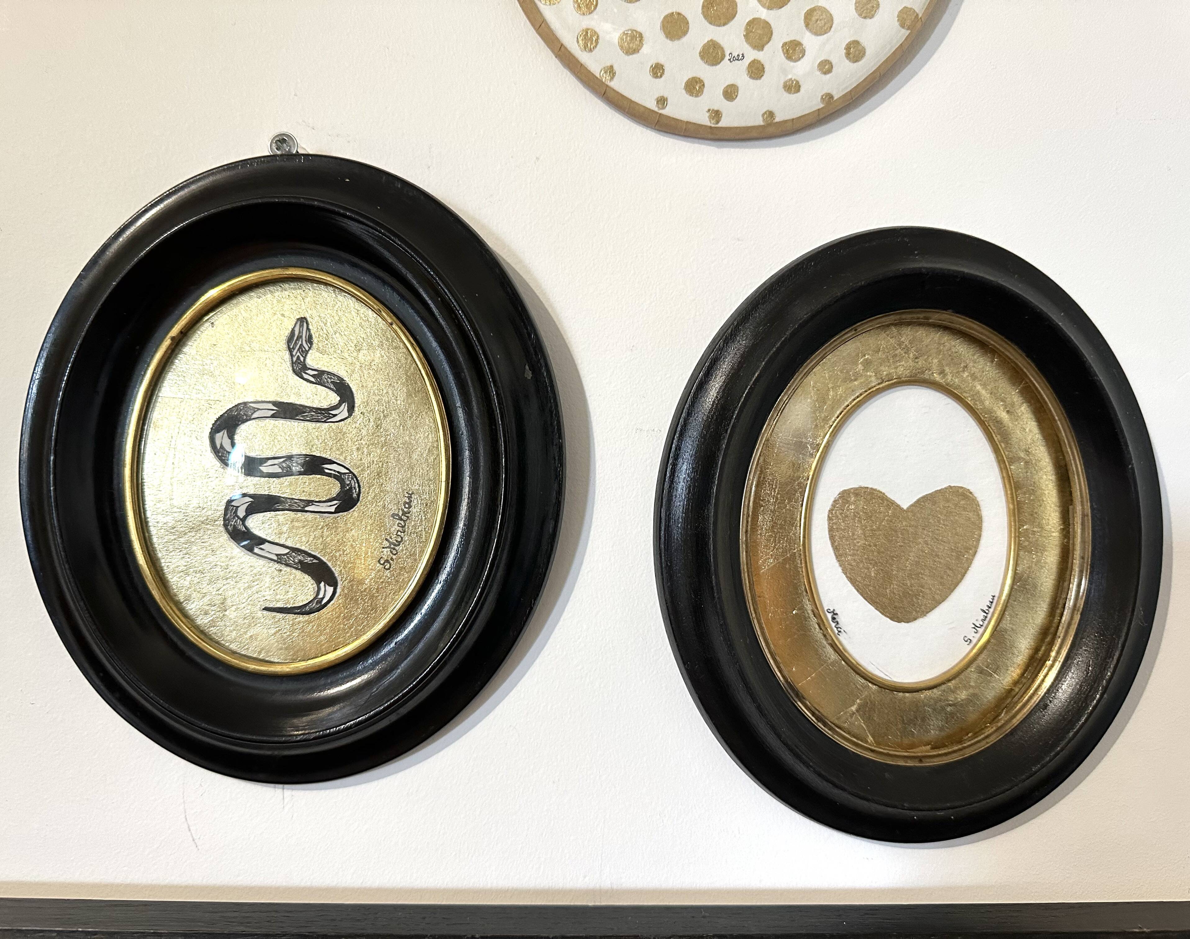 Curved glass snake frame