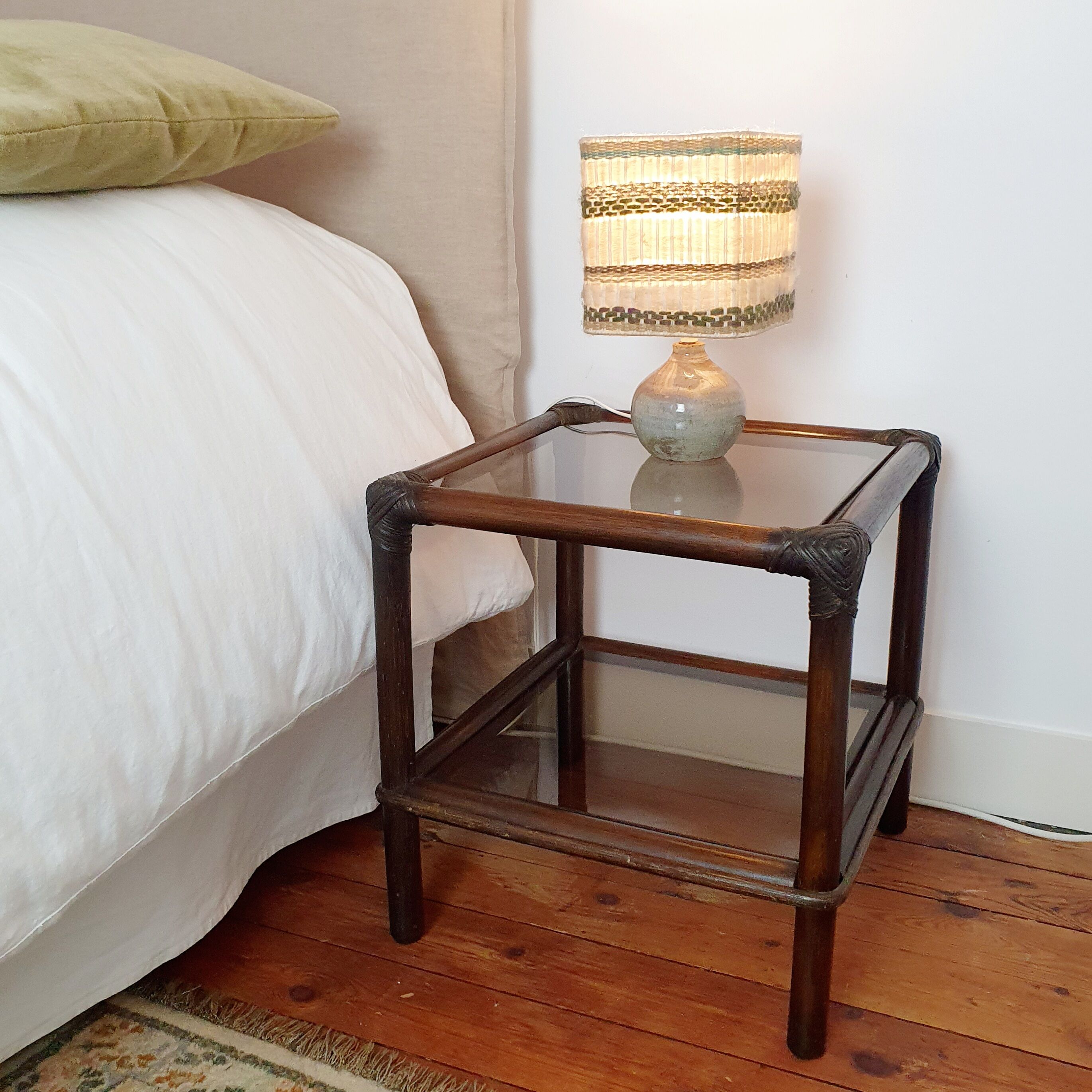 Rattan bedside and smoked glass