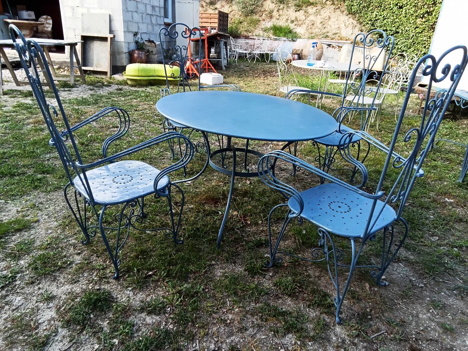 Large blue wrought iron garden furniture