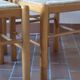 4 solid pine chairs, straw seats, shaped backrest.